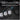 Battery charger with three batteries on a textured black surface, text about battery charging time.